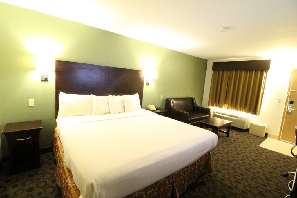 Spacious king room with sitting area and window